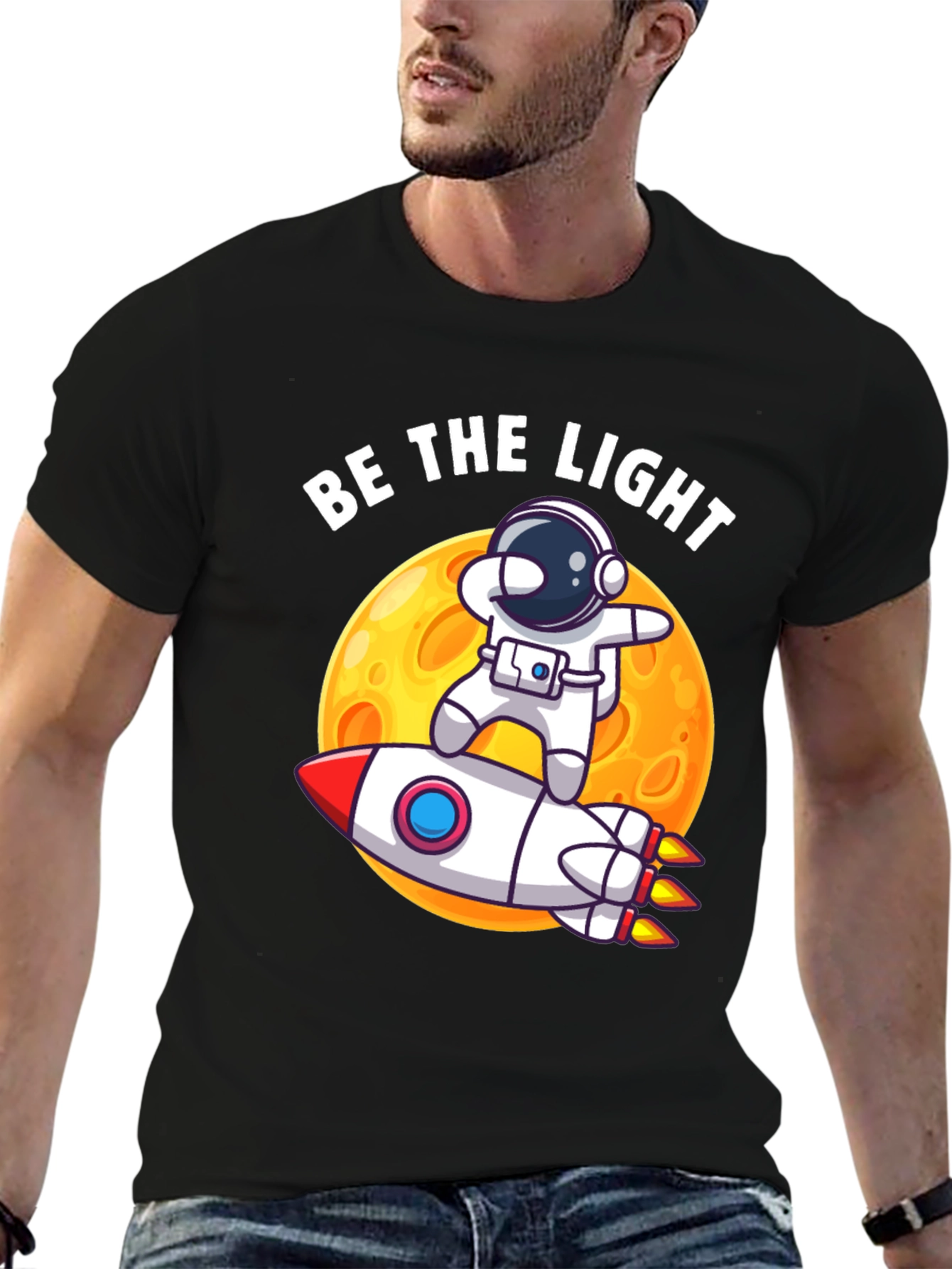 Be The Light Astronaut Rocket Graphic T-Shirt