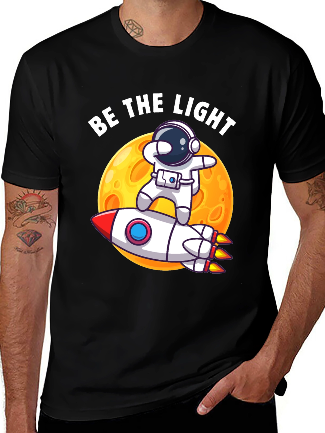 Be The Light Astronaut Rocket Graphic T-Shirt