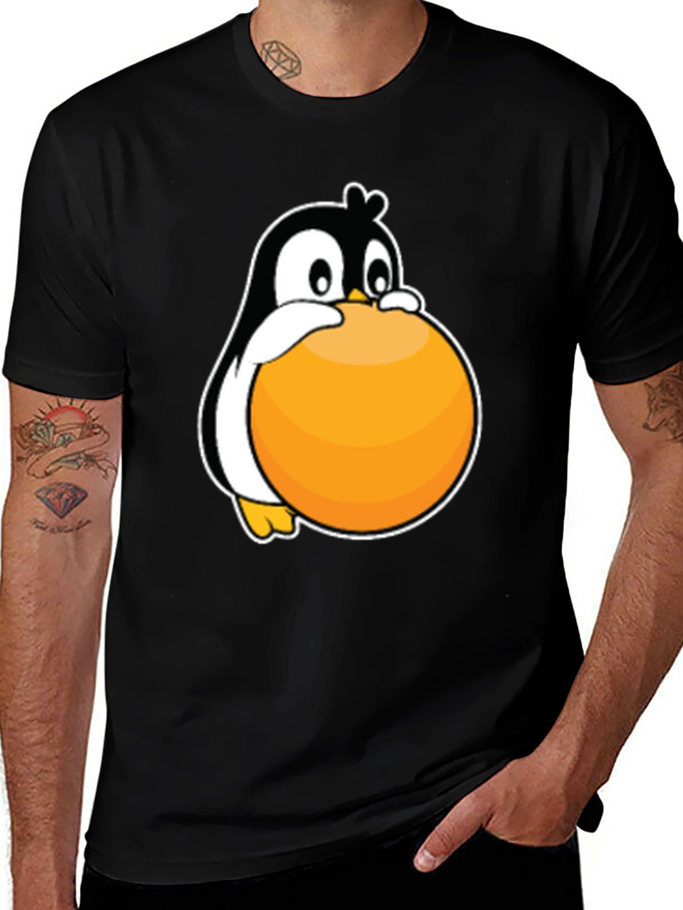 Penguin Hugging Ball Graphic Tee