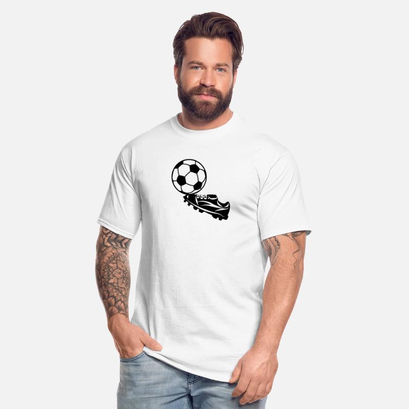 Soccer ball on tip of soccer shoe